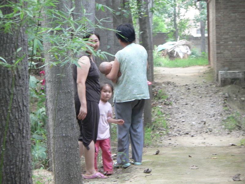 Some shy locals, amused by the antics of the crazy confluence hunters