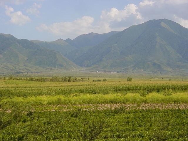 The confluence point should be in the centre of the picture at the base of the mountain