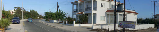 #1: House behind the Confluence with view to west