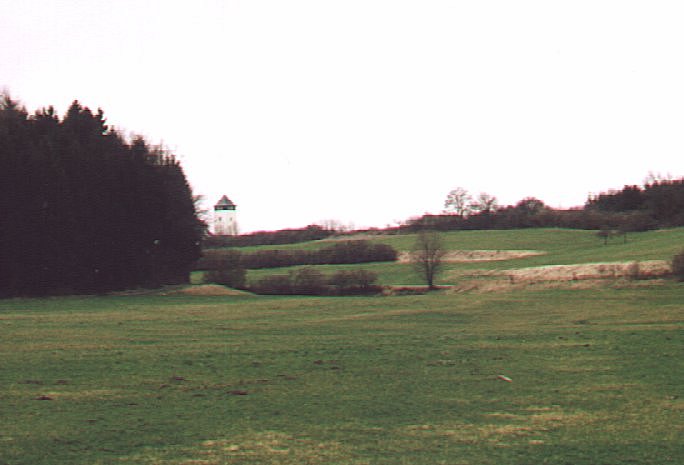 From the confluence looking west. The Church spire in Buchheim is in the distance.