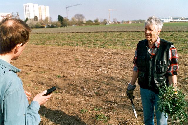 false owner with rabbit-food in his hand