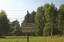 #7: A warning sign at the nearby military base: "Military Security. Trespassing Prohibited. Caution, Firearms!"