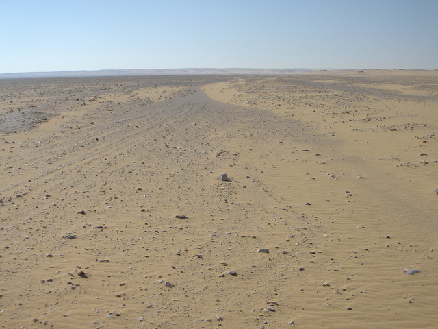 Looking across the plain to the Confluence on top of the far ridge