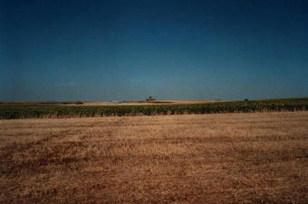 #1: View north from the confluence. In the distance the small town of Villabaruz de Campoz is visible