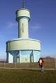 #3: Erika at the confluence point, water tower in the background