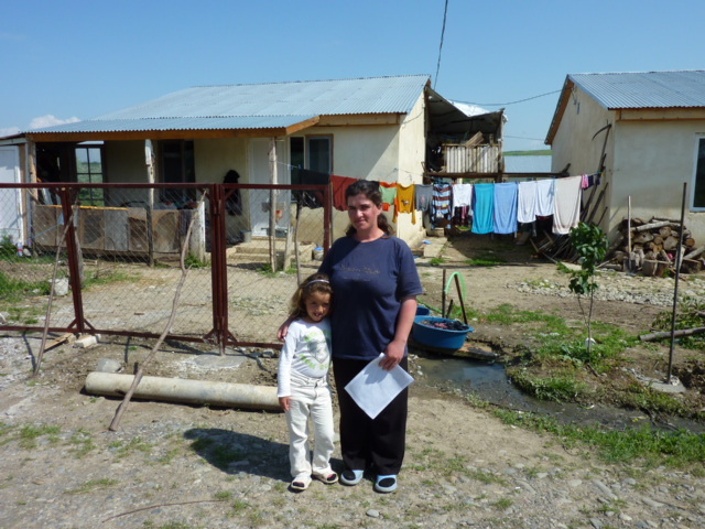 Ketino and Helena in front of their house