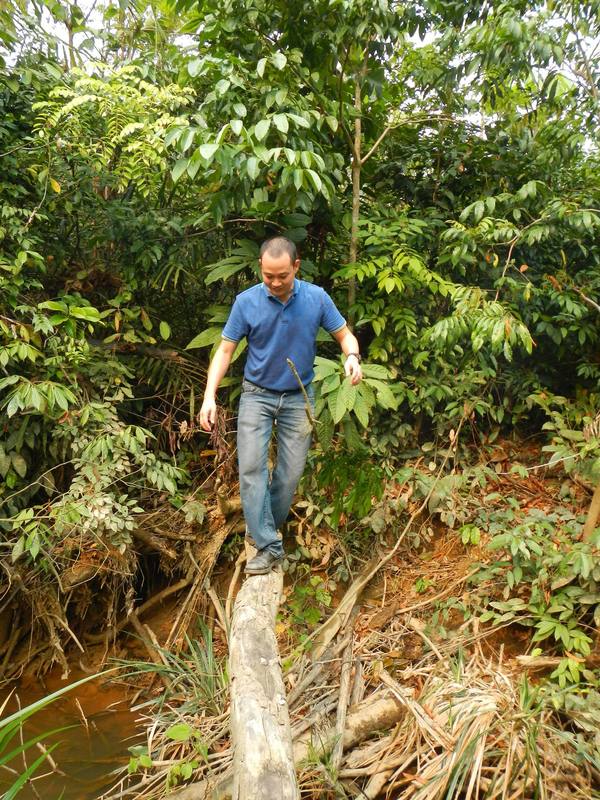 Armando crossing river