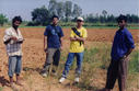 #3: Praveen, Me and the villagers finishing lunch