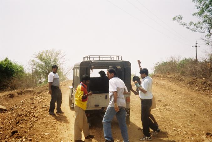 Push... if you want to go back home. The team cajoles the "jeep" to start