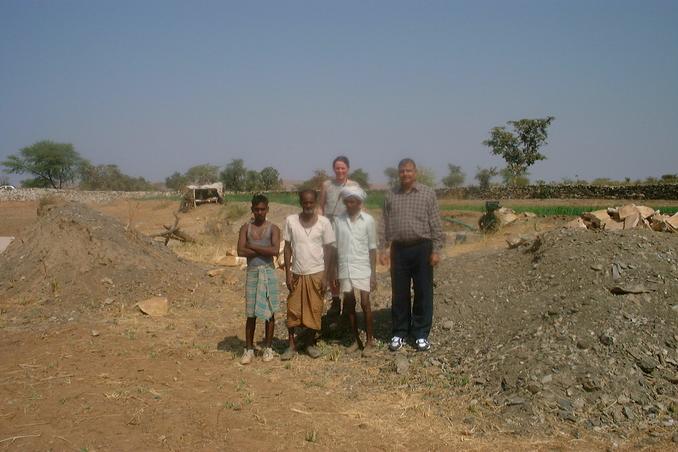 People working at the well and on the right our driver Dilbagh Singh