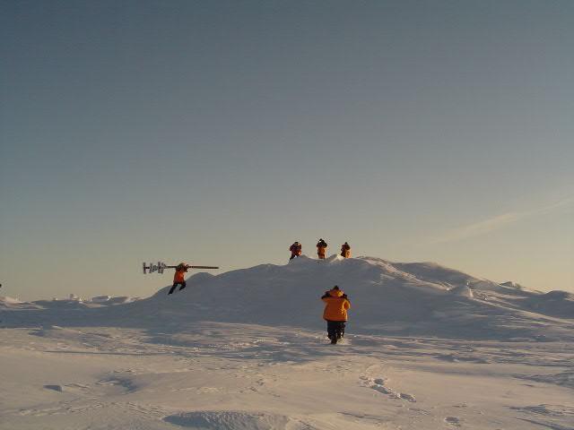 Crew locating the Pole by GPS (The striped pole is strictly for tourists)