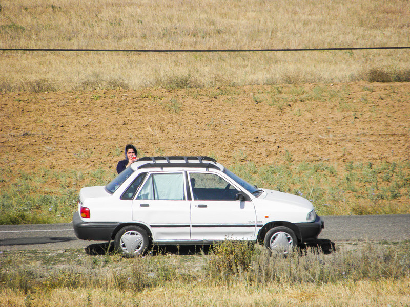 My wife taking a photo with her mobile