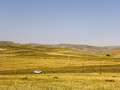 #9: Our car on the road seen from the Confluence