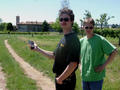 #4: Michael and Basti approaching the confluence point on the gravel way. Background: the village San Lorenzo