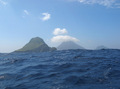 #8: Kaminone-jima (foreground) and Yokoate-jima in a rolling sea; on the way to the confluence. My brother commented our our blog, "you guys are floating around in a life size Zen garden".  And so it was.