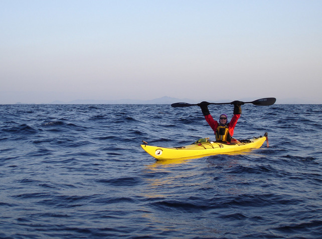 Leanne poses over the confluence, with Amakusa, our departure and destination point, in the background.