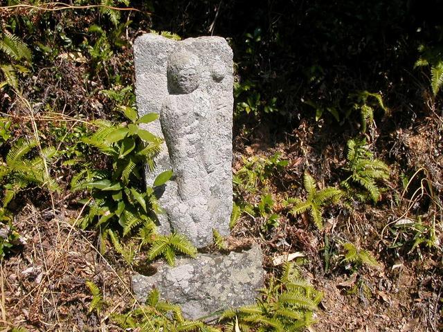 Stone Buddha on trail