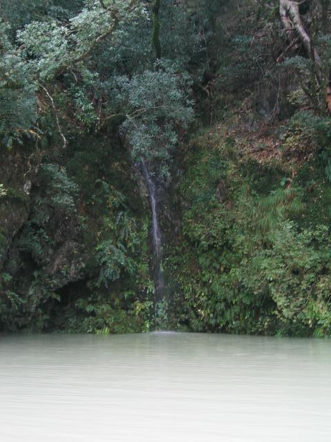 Zen-garden-like waterfall showning steepness of cliffs.