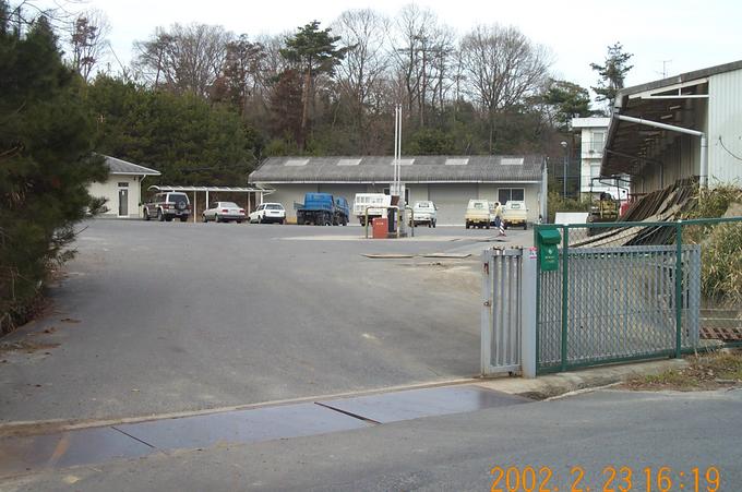 The groundskeepers’ maintenance facility entrance, across from the gate and north of the confluence location.