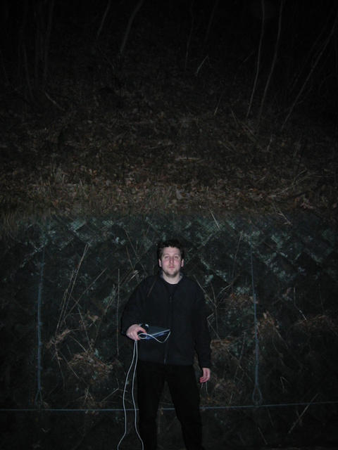 Jon standing below the confluence