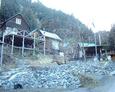 #6: A tiny village of what look like vacation homes. The confluence is on the hill behind.