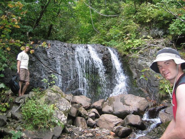 How do we get up this waterfall?  Rob (left), Mitch (right)