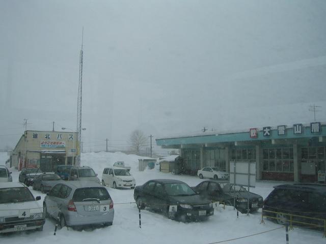 Kamikawa bus stn. on left, train stn. on right.