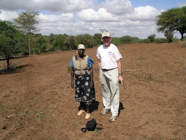 Woody poses with one of the landowners