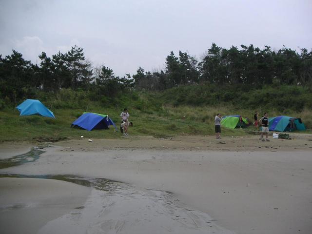 "Hurricane's a comin', make sure those pegs are in the sand good!"