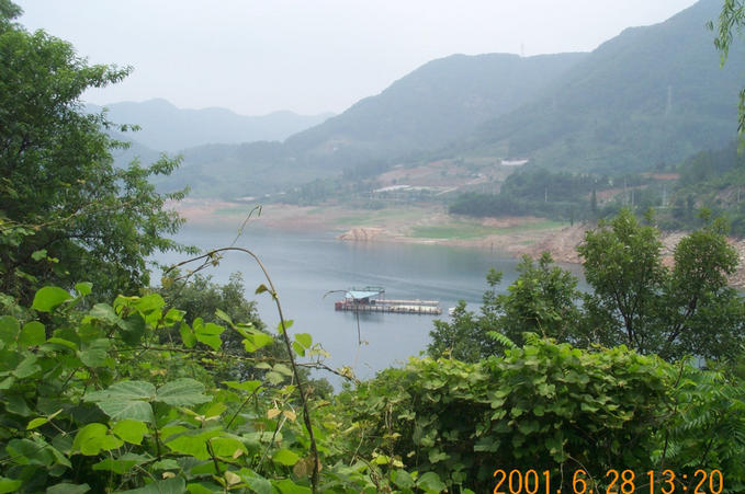 Looking south-west; a ferry stop on the lake is visible.