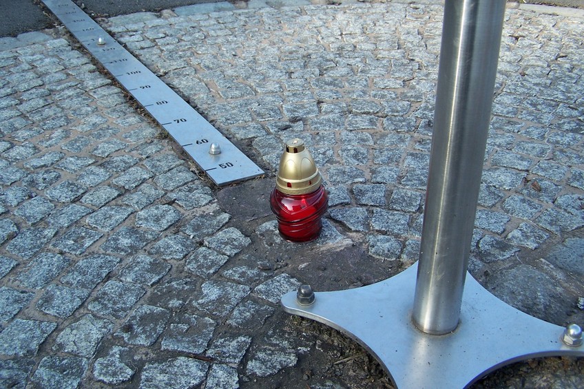 A candle lit in memory of 96 killed in the presidential plane crash