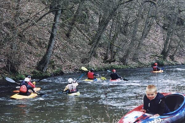 Canoes on river Clerve with grandson Yvo (insert)