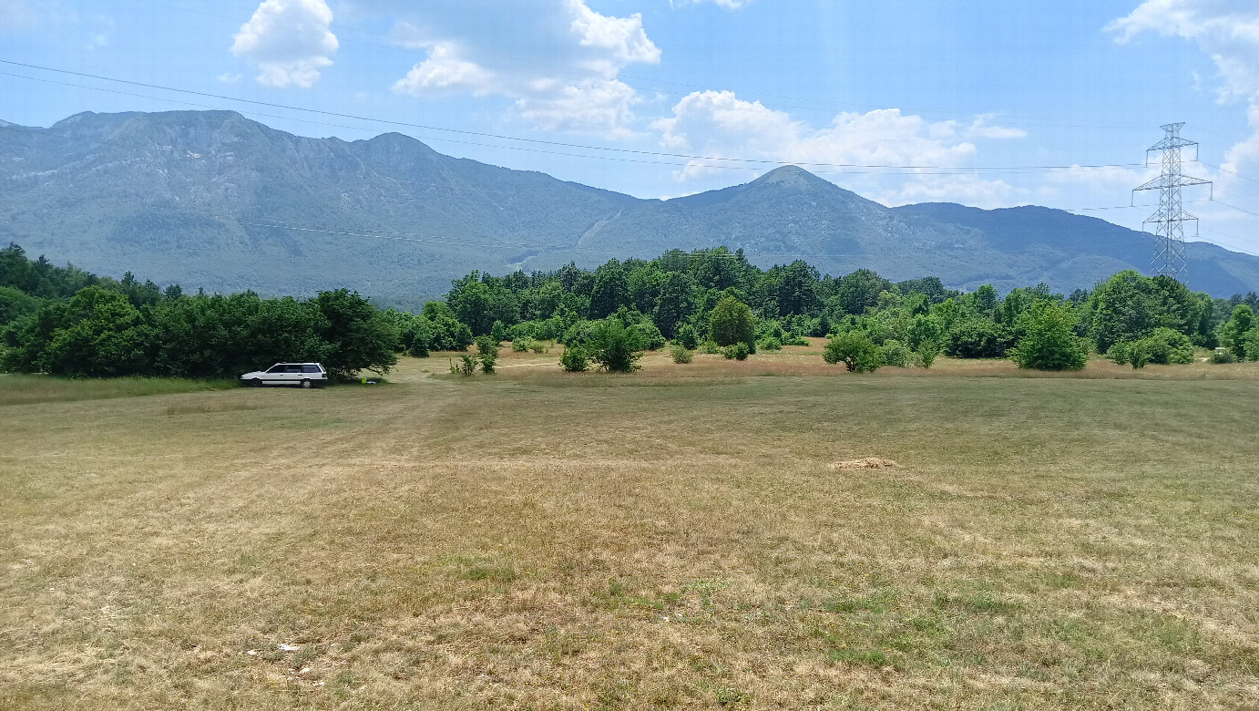 Mown slope and the mownman's car