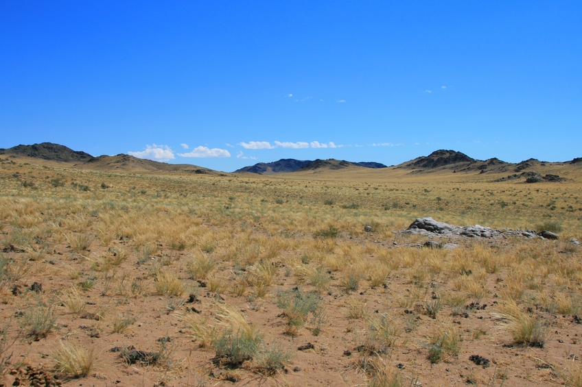 Desert valley ascending to South