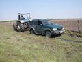 #5: The tractor is removing the truck from mud