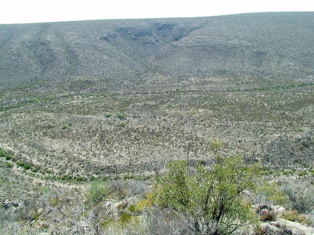 La confluencia esta a la orilla izquierda del cañon casi al llegar arriba