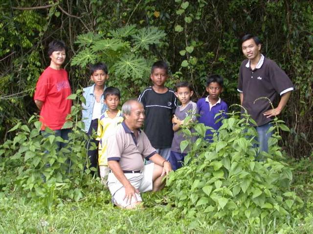 Children living around the area were curious and had their picture taken with us with the Confluence as background