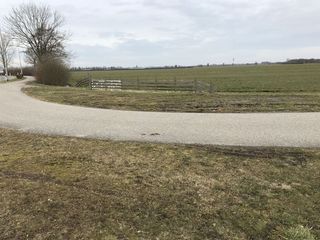 #1: Site of 52 North 5 East, in the foreground, looking northeast. 