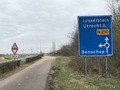 #10: Approaching roundabout where confluence is located, from the west. 