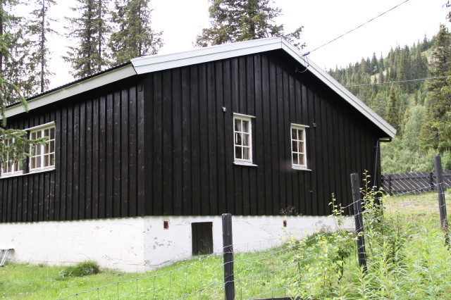 Wooden house, next to the point