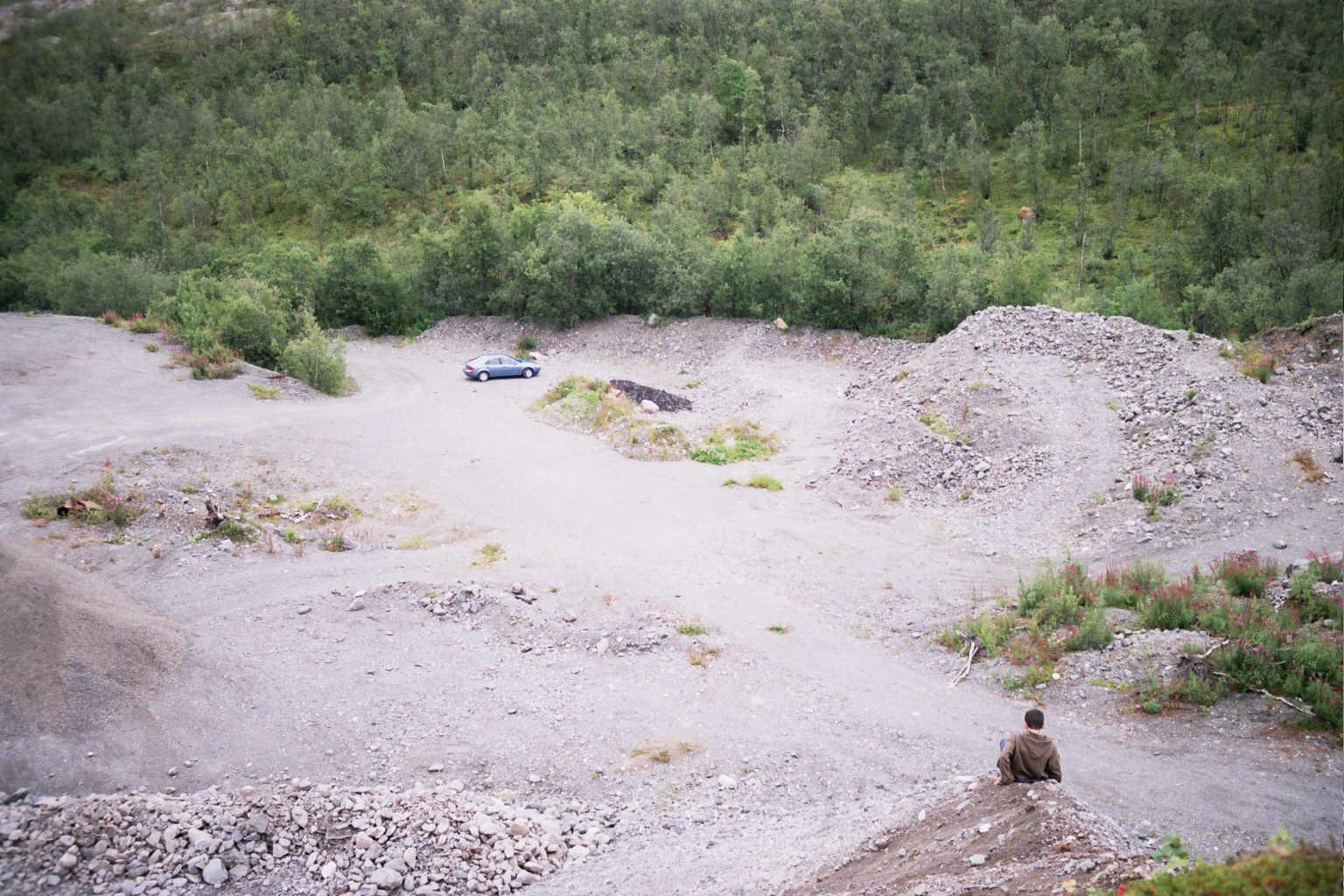 Looking down from top of the quarry walls Asaf is going down