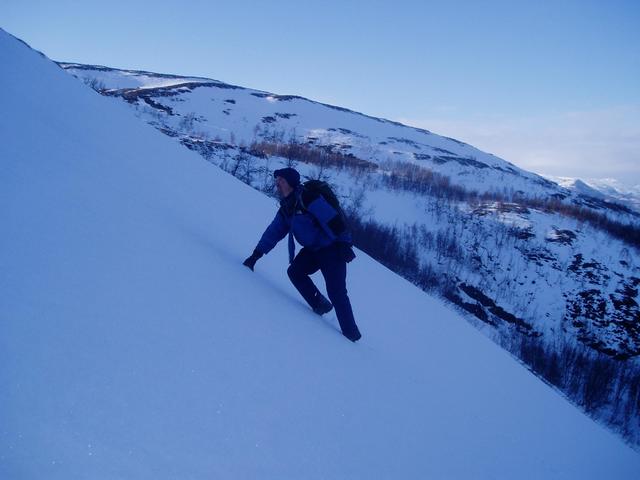 Up the steep slopes NE of the point.