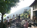 #12: The village of Naji, the closest we got to the confluence.  Manesh in white sweatshirt across on left, Mitch in plaid on right