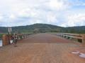 #4: Steve Crossing the bridge over the hydro dam outflow (confluence in the distance)