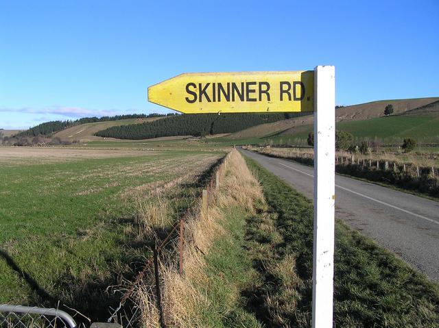 Closest road sign to the confluence, about 80 meters northwest of confluence.