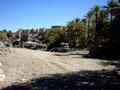 #7: Wādiy Mahram, with old houses on a cliff and date palms.