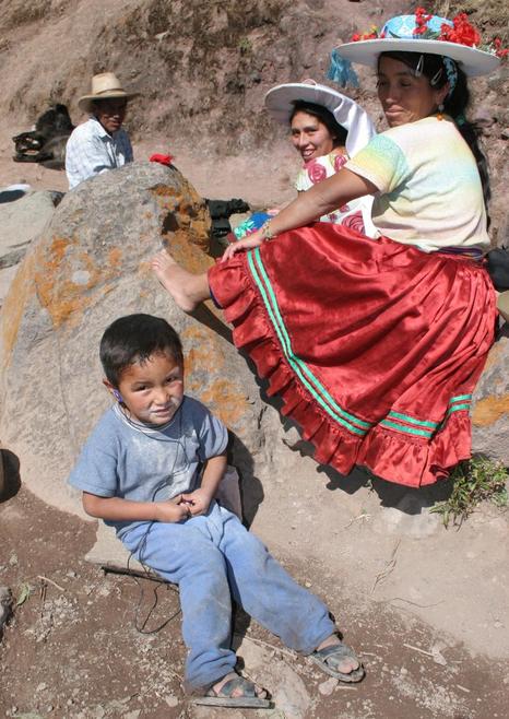 friendly people from the nearby village washing their clothes