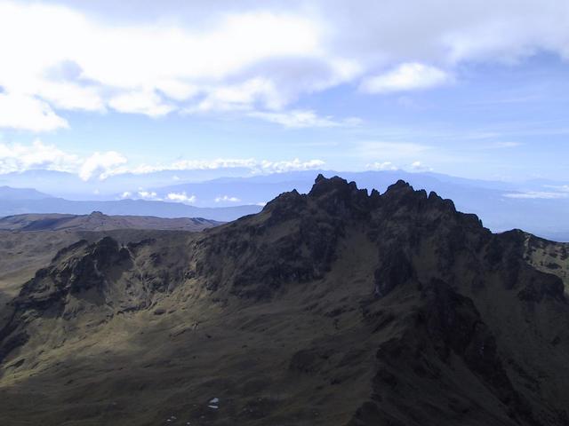 View from Mt. Giluwe (4367m) towards Giluwe 2 and Mt. Wilhelm (4509m) on the horizon