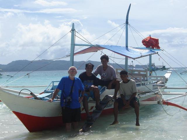 The visitors and the boat in which the visit was made