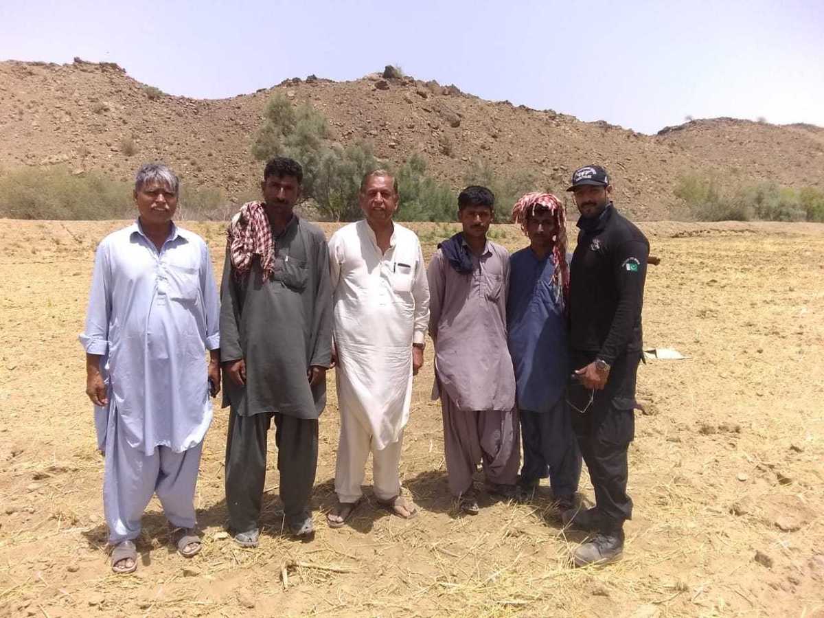 Myself driver Ayoob,security guard and land owners at confluence point